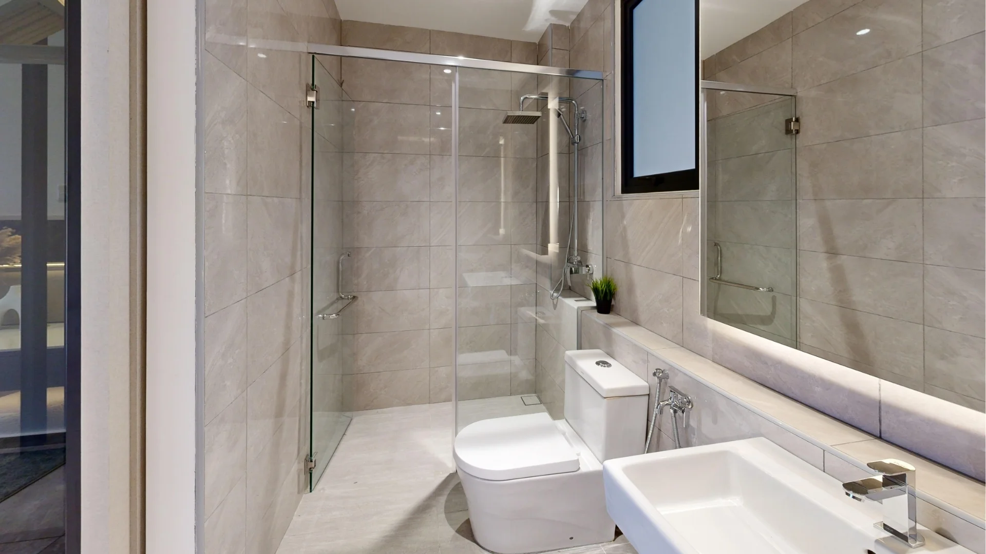 Type A show-unit bathroom with a glass shower screen